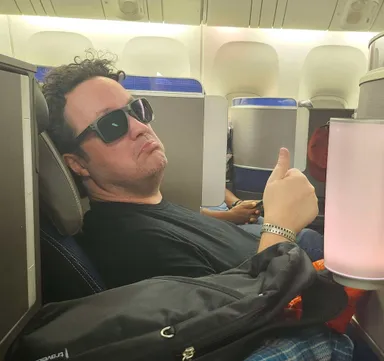 Levi in airplane seat.