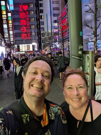 Levi & Anna in front of Kabukicho Sign