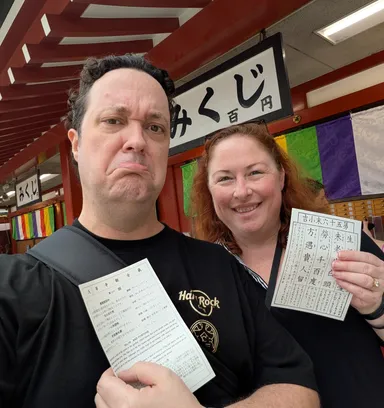 Anna & Levi with paper fortunes
