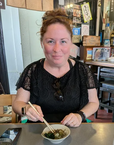 Anna trying whitebait.