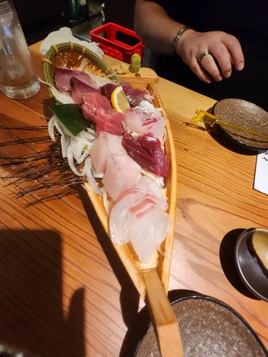 Izakaya sushi, and my big fat Dr. Claw hand